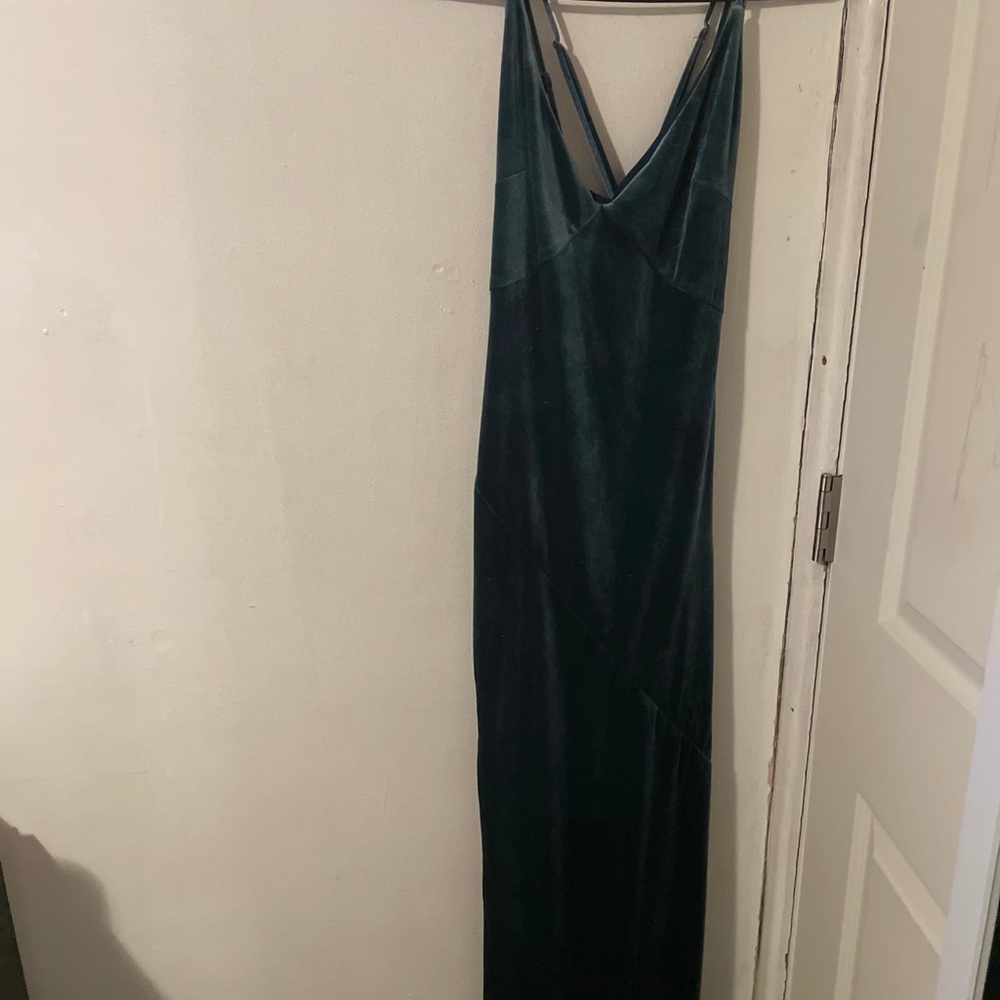 Dark teal velvet gown with slit